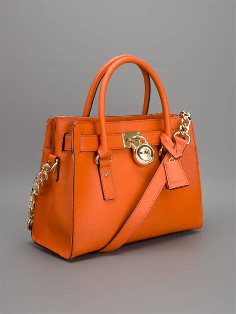 michael kors orange bag satchel|Michael Kors opened satchel purse.